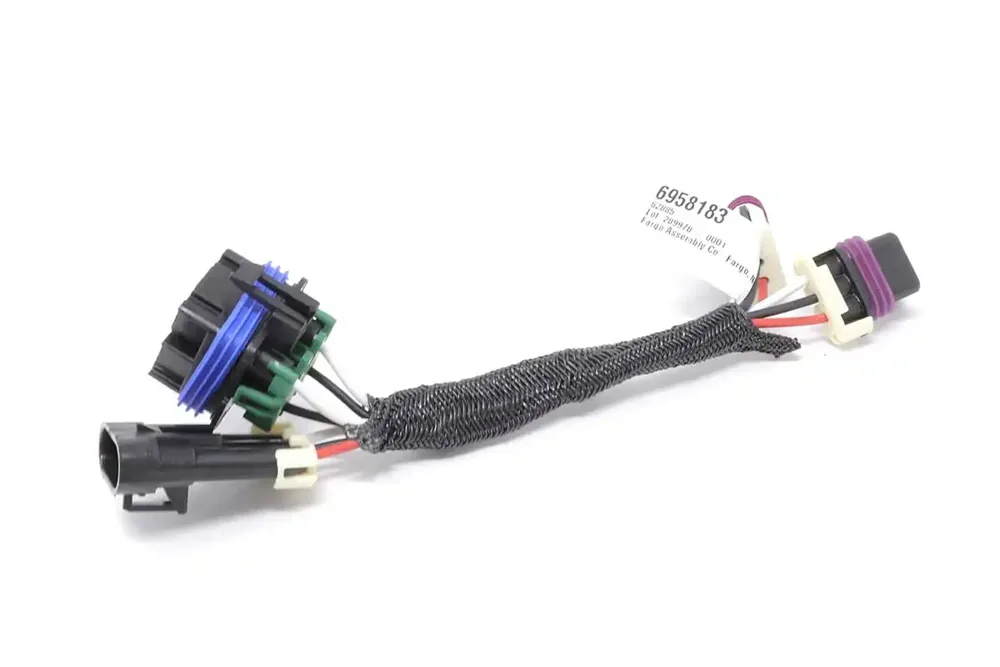 6958183 — HARNESS LASER