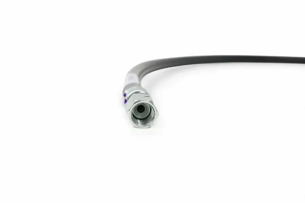 7106590 — HOSE ASSY